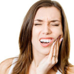 Зубная боль: причины, симптомы и лечение